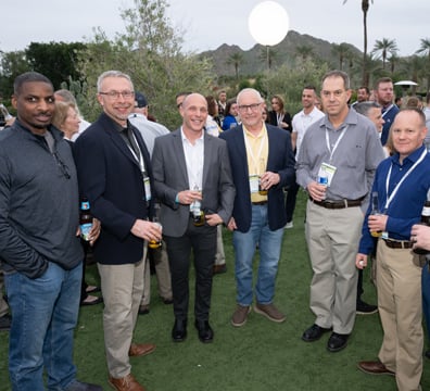 Large group of attendees together at the welcome reception
