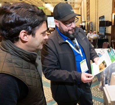 Attendee meeting with Sponsor at their tabletop