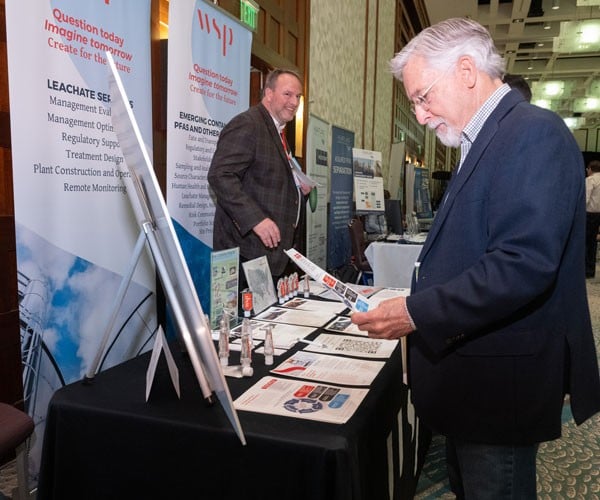GWMS Attendee reviewing sponsor materials